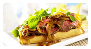 Grilled Beef Steak Sandwich with Melted Onions